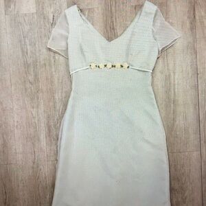 Elegant Cream Dress with Floral Detail